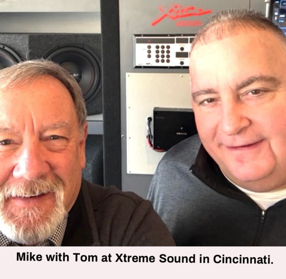 Mike and Tom posing for a selfie at Xtreme Sound in Cincinnati, with audio equipment in the background.