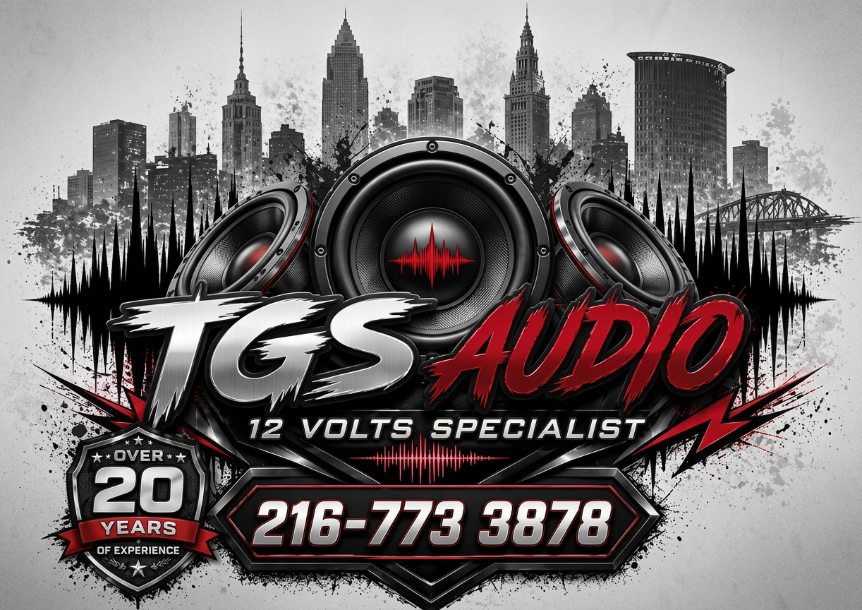 Logo design for TGS Audio, featuring large speakers, sound wave graphics, and a city skyline background. Includes text about being a 12 volts specialist and contact information.